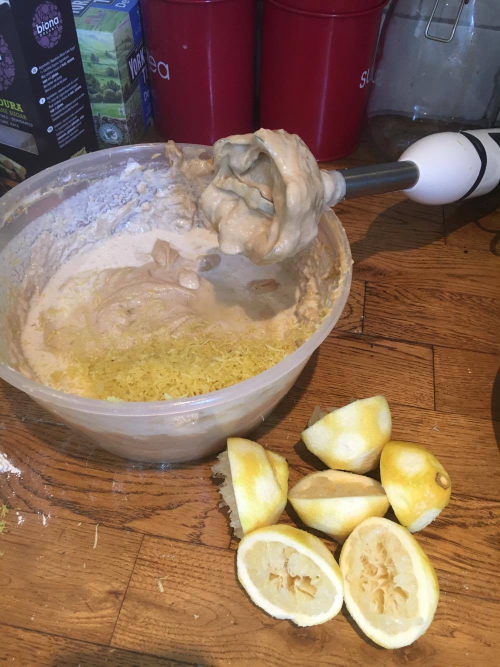 adding buttermilk, then lemon rind and juice to the mix