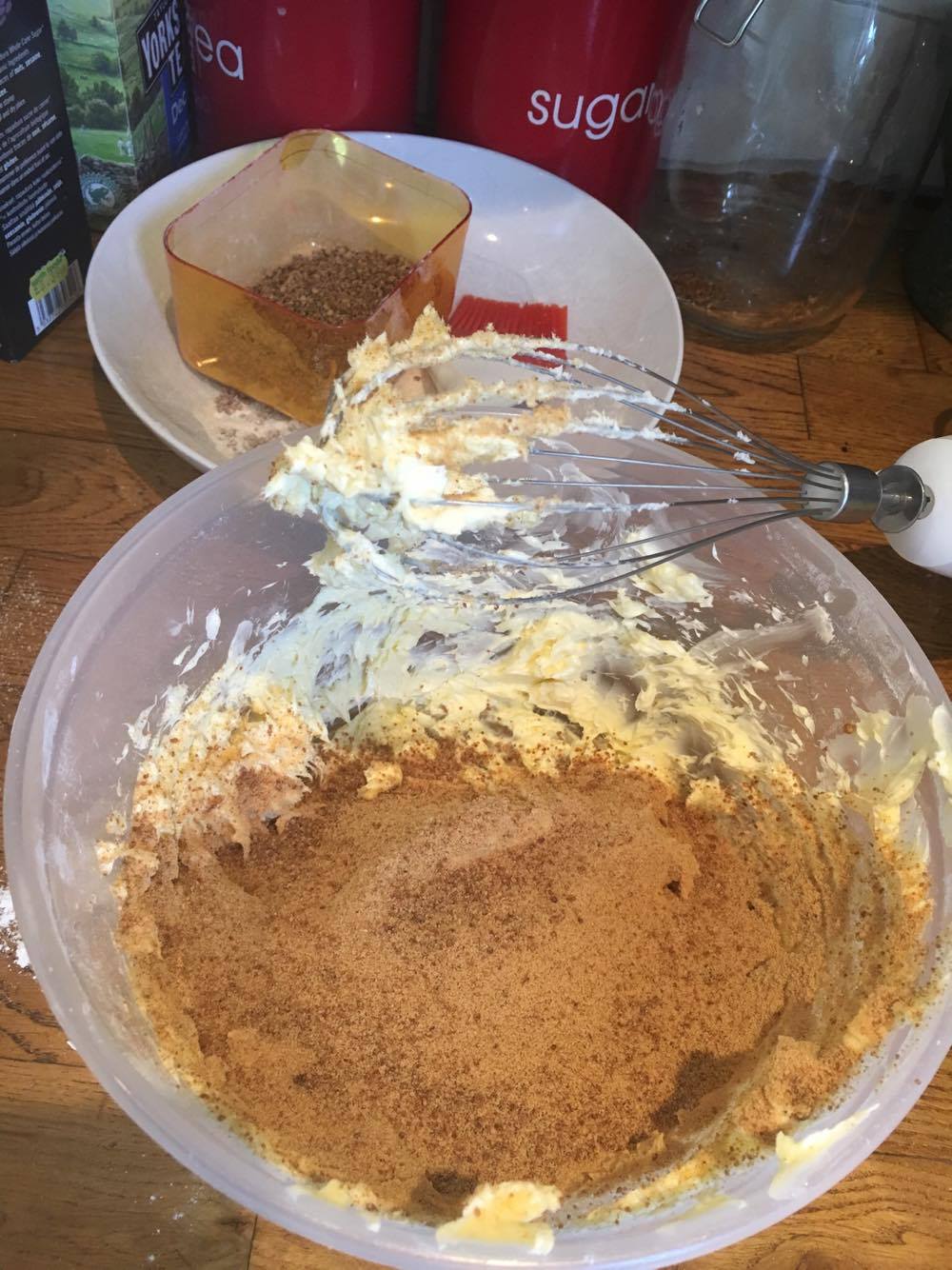 Adding Organic Cane Sugar to the creamed butter